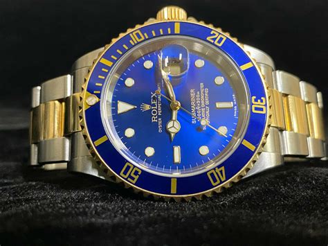 rolex submariner blue and gold.